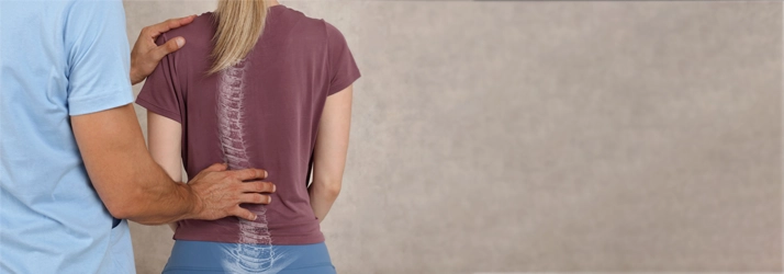 Chiropractic Auburn WA Posture A chiropractor inspecting a patients spinal alignment.
